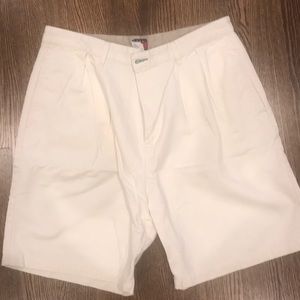 White pleated shorts